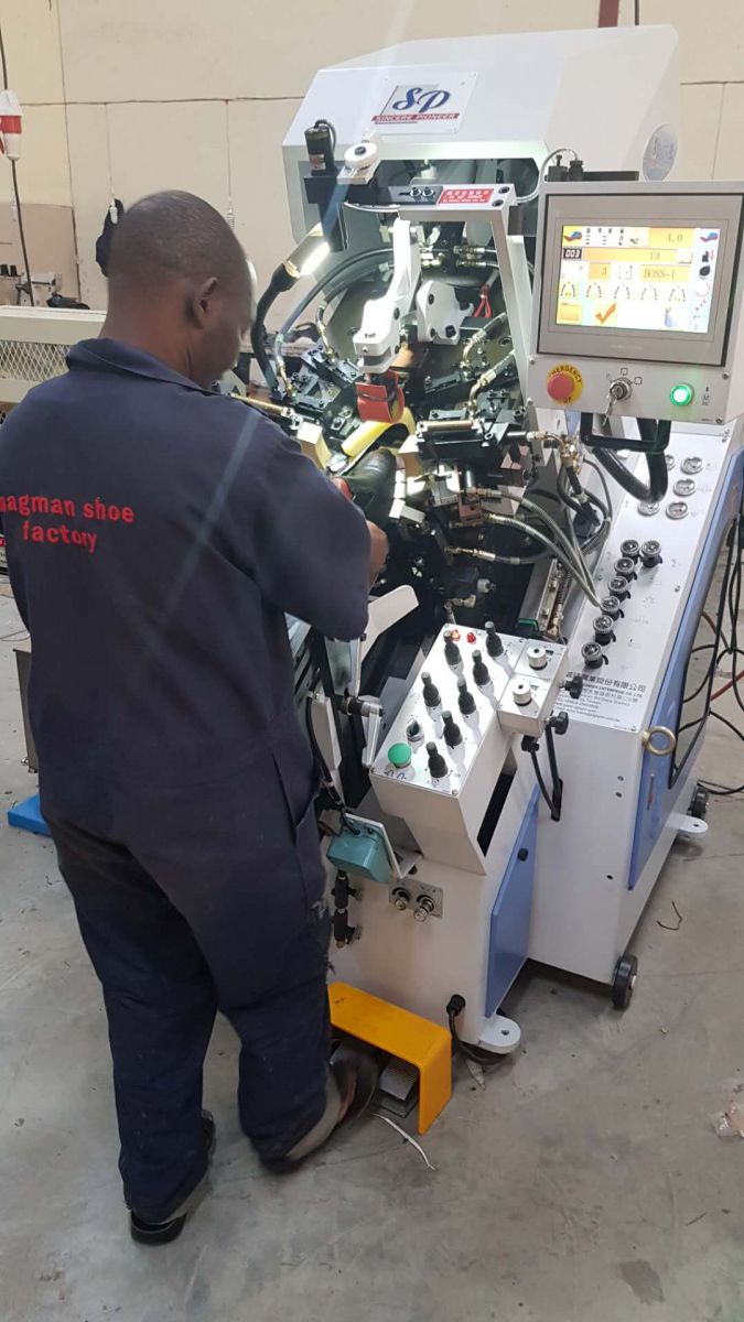 TS-818A computerized toe lasting machine operated at Magman shoe factory Kenya TS-818A computerized toe lasting machine operated at Magman shoe factory Kenya